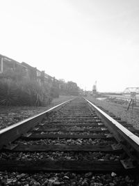 Surface level of railway tracks against clear sky