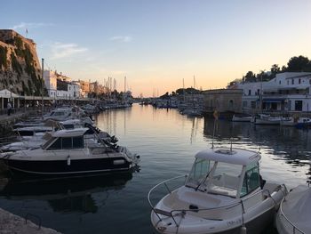 Boats moored at harbor