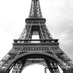 Close up to the eiffel tower in black and white