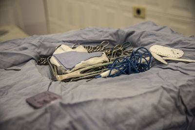 Close-up of blanket on bed at home