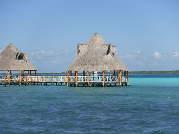 Panoramic view of sea and building against sky