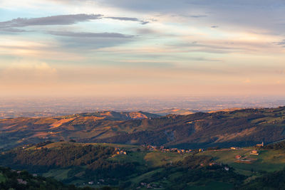 Scenic view of landscape against sky during sunset