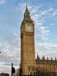 Low angle view of big ben against sky