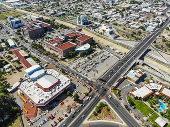 High angle view of street amidst buildings in city