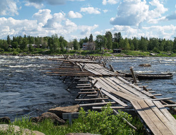 View of river leading towards trees