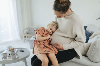 Mother and daughter at home