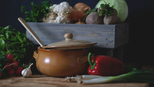 Close-up of fruits and vegetables on cutting board