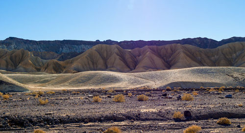 Scenic view of mountains against clear sky