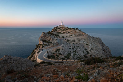 Scenic view of sea against clear sky during sunset