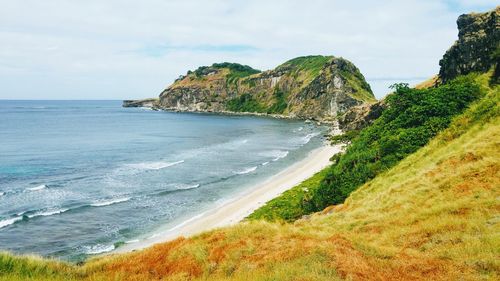 Scenic view of beach against sky