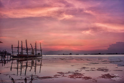 Scenic view of sea at sunset