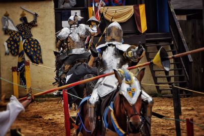 Knights in armor riding horses