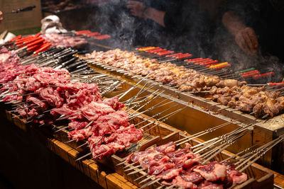 Close-up of meat on barbecue grill