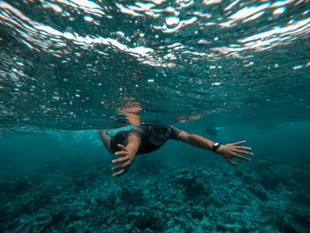 Woman swimming in sea
