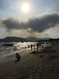 Scenic view of beach against sky during sunset