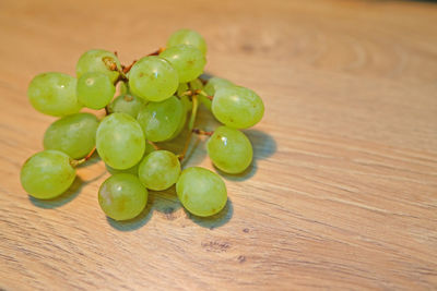 Close-up of grapes on table