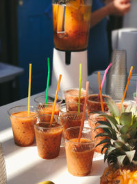 Close-up of drink glasses on table