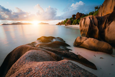 Scenic view of sea against sky at sunset