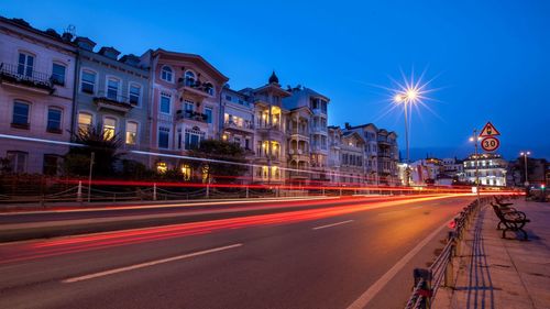 Light trails on city street at night