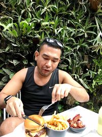 High angle view of man eating food