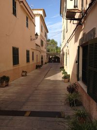 Narrow alley with buildings in background