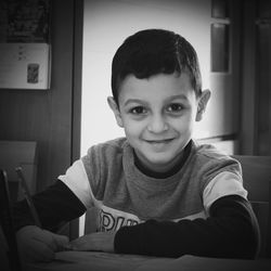 Portrait of smiling boy at home