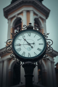 Low angle view of clock