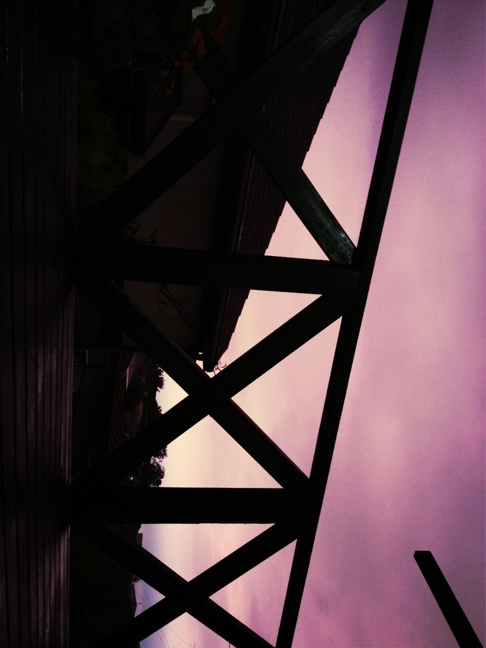 metal, low angle view, metallic, built structure, architecture, sky, connection, red, engineering, railing, no people, pattern, outdoors, bridge - man made structure, day, silhouette, structure, iron - metal, sunlight, part of