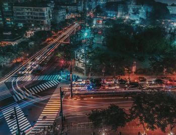 High angle view of light trails on road in city