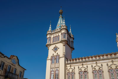 Low angle view of cathedral against clear blue sky