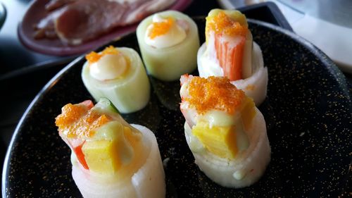 Close-up of sushi served on plate