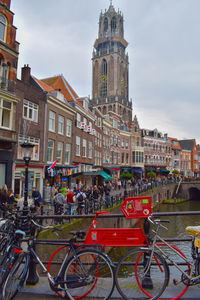 Bicycles against sky in city