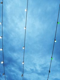 Low angle view of street light against sky