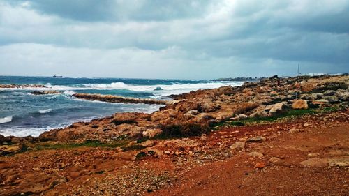 Scenic view of beach against sky