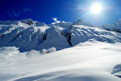 Snow covered mountain against sky