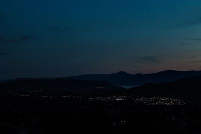 Illuminated cityscape at night