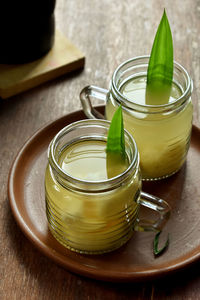 Close-up of hit cassava tape drink on table, indonesia traditional drink