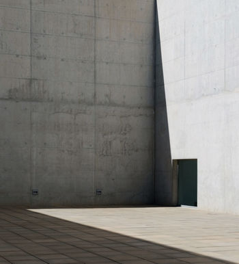 Concrete architecture with hard sunlight and shadows