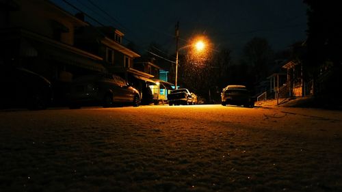 Illuminated street light at night