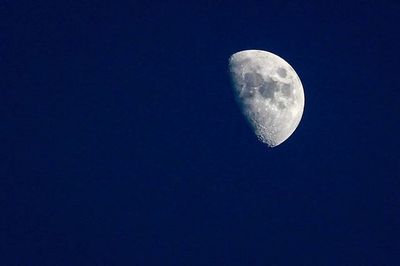 Low angle view of moon in sky