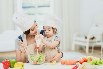 Midsection of woman with ice cream