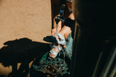 High angle view of man holding camera