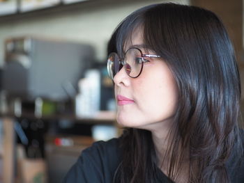 Close-up of woman looking away