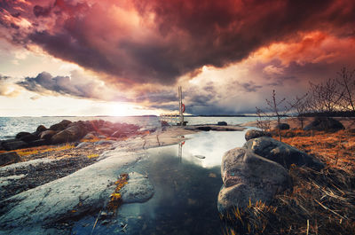 Scenic view of sea against sky during sunset