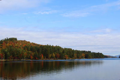 Scenic view of lake against sky during autumn