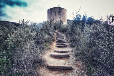 Scenic view of water tower against sky