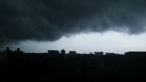 Storm clouds over city