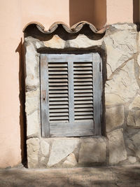 Closed window of old building