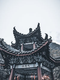 Low angle view of temple building against clear sky