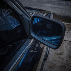 High angle view of side-view mirror of car